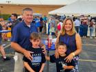 Family enjoying the Big Greek Food Fest of Niles