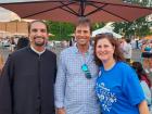 Church leader with staff at the Big Greek Food Fest of Niles
