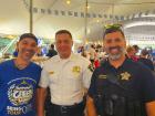 Police officers and festival staff enjoying St Demetrios Greek Fest in Elmhust