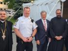 Church leaders and police officers at the St. Demetrios Elmhurst Greek Fest