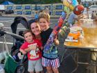 Family enjoying the St. Nectarios Greek Fest in Palatine