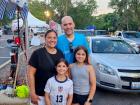 Drive-thru volunteers at St. Nectarios Greek Fest in Palatine