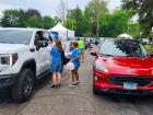 Drive-thru volunteers at St Nectarios Greek Fest in Palatine