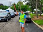 Drive-thru volunteer at St Nectarios Greek Fest in Palatine
