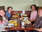 Friends enjoying breakfast at Maple Butter Cafe in Plainfield