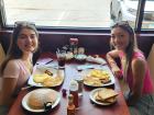 Friends enjoying breakfast at Maple Butter Cafe in Plainfield