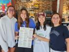 Friends enjoying breakfast at Maple Butter Cafe in Plainfield