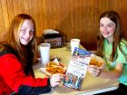 Young customers enjoying lunch at Nick's Drive In Restaurant Chicago