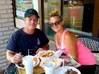 Couple enjoying outdoor lunch at The Works Gyros in Glenview