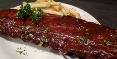 The famous BBQ Baby Back Ribs at Andrew's Open Pit & Spirits in Park Ridge