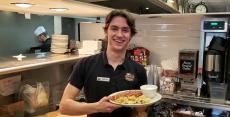 Friendly server at Around The Clock Restaurant in Crystal Lake