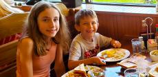 Brother and sister enjoying lunch at Billy's Pancake House in Palatine