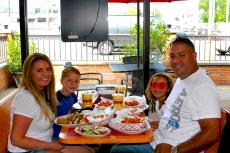 Family enjoying lunch at Brandy's Gyros in Chicago