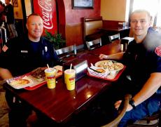 Emergency officers enjoying lunch at Brandy's Gyros in Hanover Park