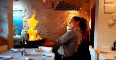 Serving flaming Saganaki at Brousko Authentic Greek Cuisine in Schaumburg