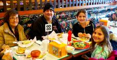 Family enjoying lunch at Burger Baron Restaurant in Arlington Heights