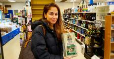 Happy shopper at Columbus Food Market and Gifts in Des Plaines