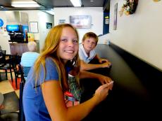 Brother and sister enjoying lunch at Craving Gyros in Lake Zurich