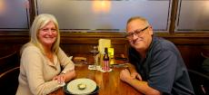 Couple enjoying dinner at Ellwood Steak & Fish House in DeKalb