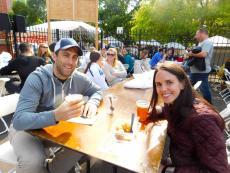 Couple enjoying Lincoln Park Greek Fest at St. George Greek Orthodox Church in Chicago