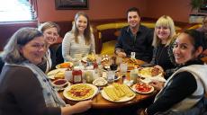 Friends enjoying breakfast at Lumes Pancake House in Chicago