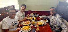 Friends enjoying breakfast at Maple Butter Cafe in Plainfield