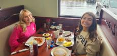 Friends enjoying breakfast at Maple Butter Cafe in Plainfield