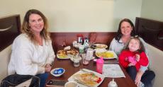 Family enjoying breakfast at Maple Butter Cafe in Plainfield