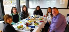 Friends enjoying lunch at Mykonos Greek Restaurant in Niles