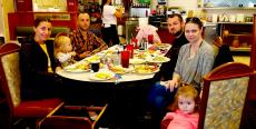 Family enjoying lunch at Niko's Breakfast Club in Romeoville