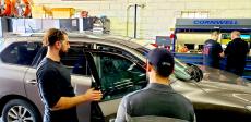 Service staff helping customers at Oak Lawn Auto in Oak Lawn