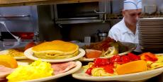 Assorted breakfast dishes at Omega Restaurant & Pancake House in Downers Grove