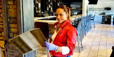 Happy carryout customer at Plateia Mediterranean Kitchen & Bar in Des Plaines