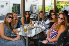 Friends enjoying the outdoor patio at Plateia Mediterranean Kitchen & Bar in Des Plaines