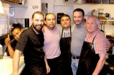 Hard working kitchen crew at Plateia Mediterranean Kitchen & Bar in Des Plaines
