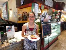 Happy customer enjoying pie at Rose Garden Cafe in Elk Grove Village