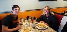 Couple enjoying breakfast at Teddy's Diner in Elk Grove Village