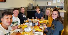 Friends enjoying breakfast at Teddy's Diner in Elk Grove Village