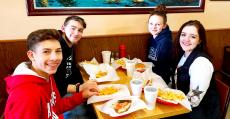 Friends enjoying lunch at The Works Gyros in Glenview