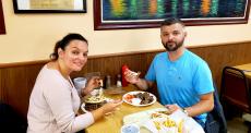 Couple enjoying the famous gyros at The Works Restaurant in Glenview