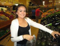 Happy customer shopping at Village Market Place in Skokie