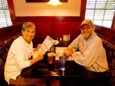 Couple enjoying dinner at Woodfire Tavern in Long Grove
