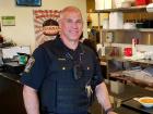 Police officer enjoying lunch at Charkie's Restaurant in Carol Stream