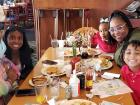 Family enjoying breakfast at Lumes Pancake House Chicago