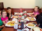 Family enjoying breakfast at Maple Butter Cafe in Plainfield