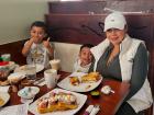 Family enjoying breakfast at Maple Butter Cafe in Plainfield