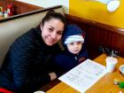 Mother and son enjoying lunch at Tasty Waffle Restaurant in Romeoville