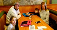 Family enjoying breakfast at Apple Villa Pancake House in Hoffman Estates