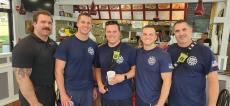 Fire department enjoying lunch at Charcoal Flame Grill in Morton Grove