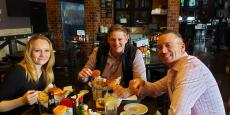 Friends enjoying lunch at Draft Picks Sports Bar in Naperville